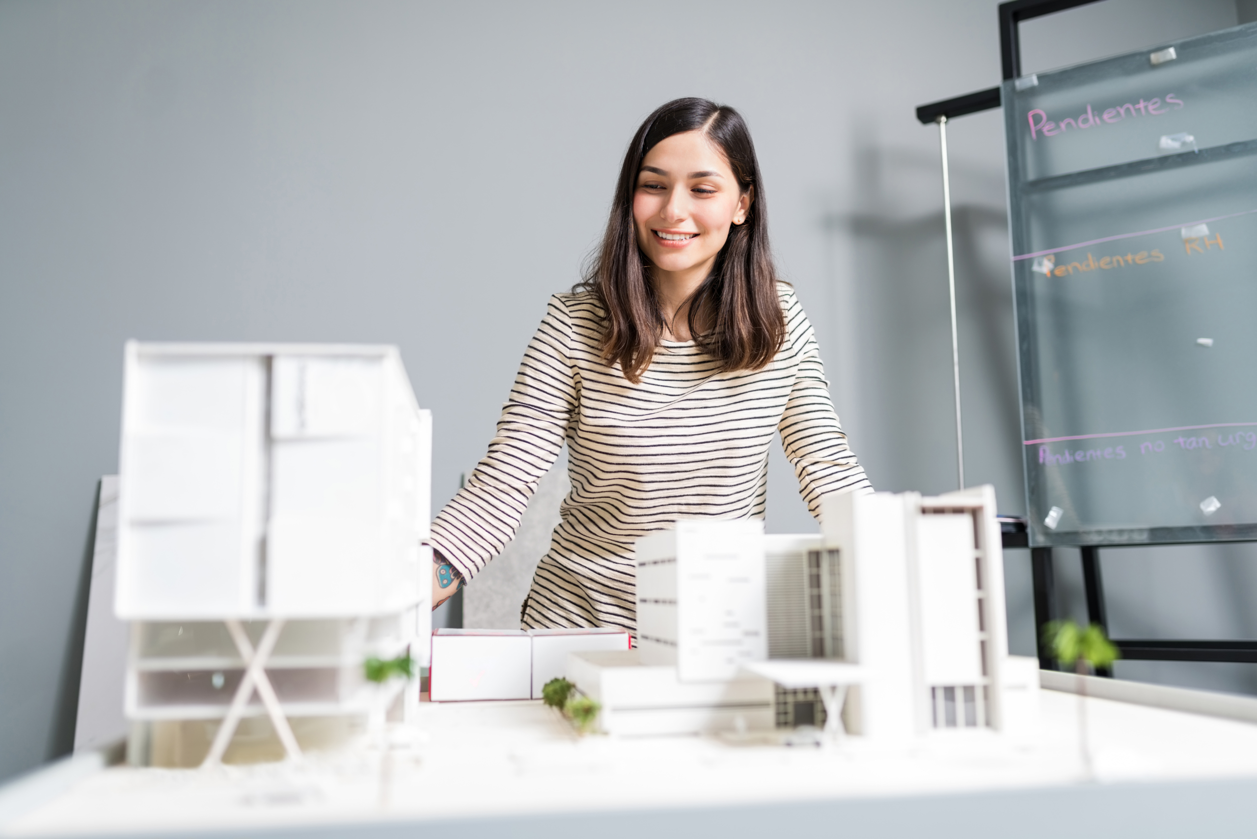 Confident Architect Admiring New Project At Office